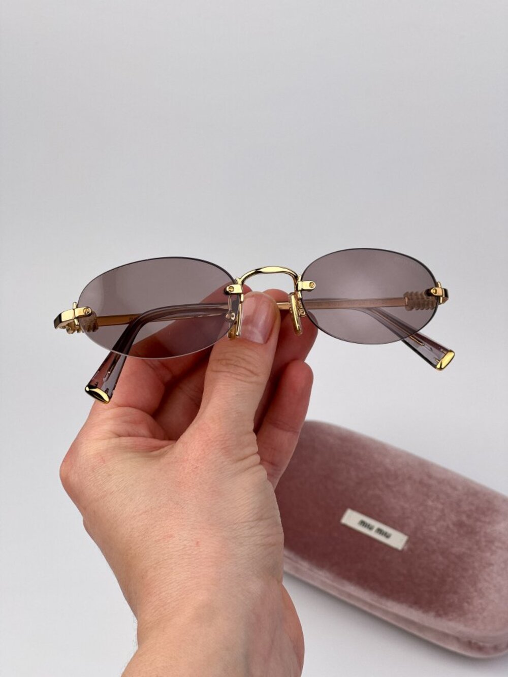 Miu Miu Women’s Sunglasses Gold Purple Brown Oval Frames MUA54S 5AK20I NEW